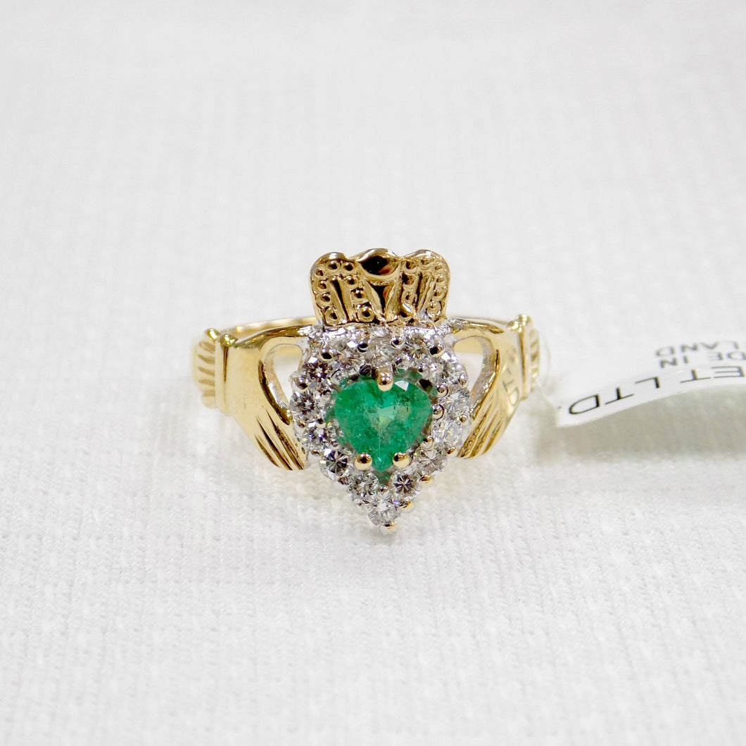 Irish made gold Claddagh ring with emerald and diamond