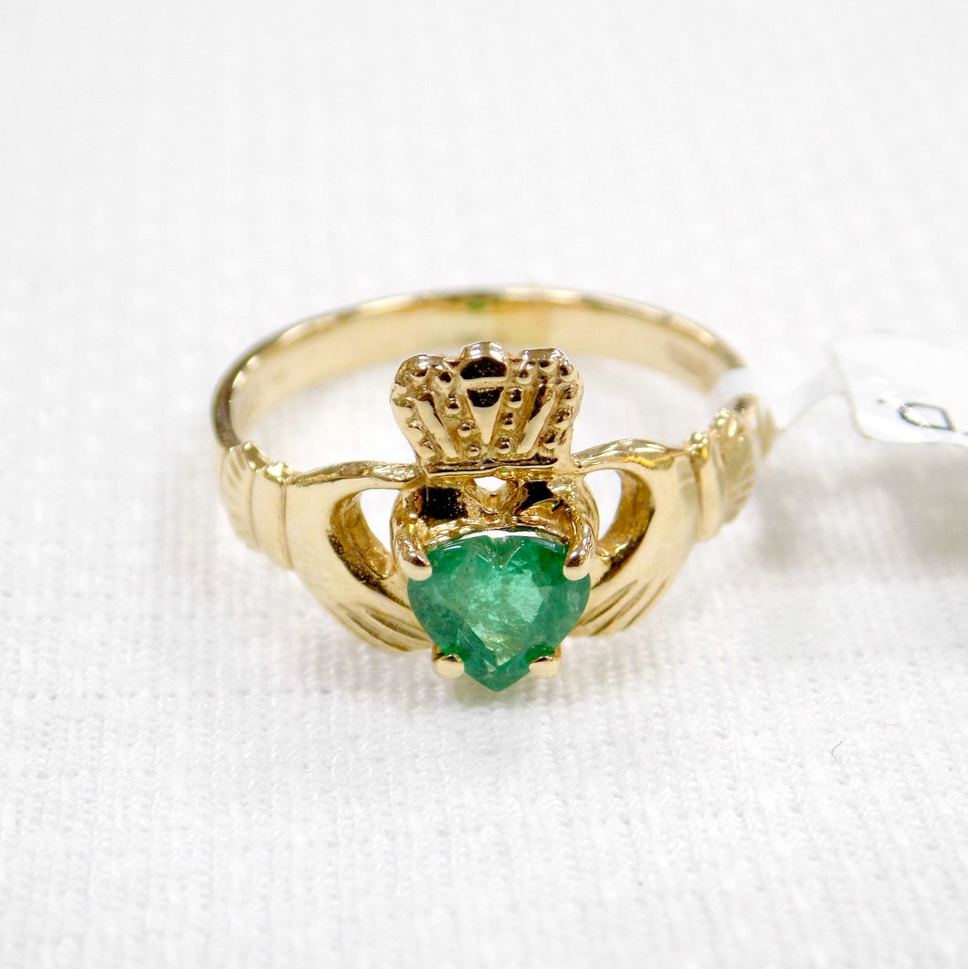 Ladies gold Claddagh ring with real emerald heart.