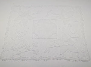 Handmade Carrickmacross lace with flowers and harp.