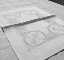 Load image into Gallery viewer, Damask Irish linen placemat with celtic cross pattern
