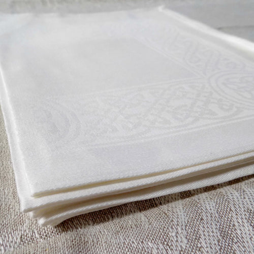 White Irish linen placemat with celtic weave