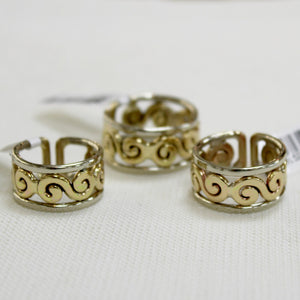 Celtic style rings with swirl design