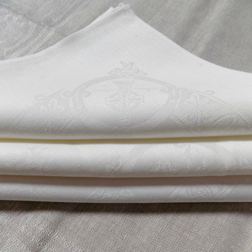 folded white Celtic Irish linen napkins