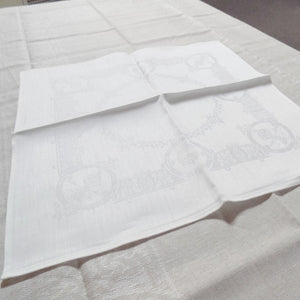 pattern of white Irish linen napkins in Celtic pattern
